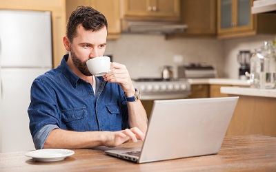 Man working at home on a computer