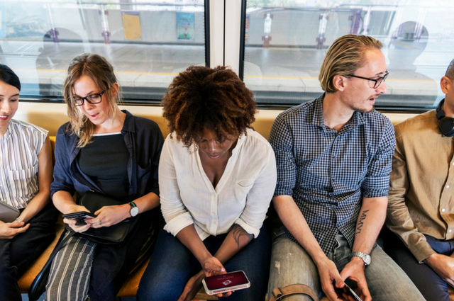 Picture of commuters travelling on the train