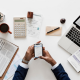 A picture of a business man sitting at his desk working on making tax digital