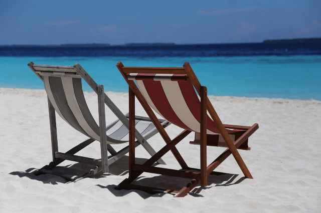 Picture of empty deckchairs on a bright sunny beach