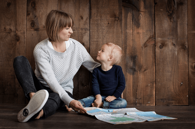 A picture of a mother playing with her child