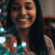 Picture of a female offie working sitting near a Christmas tree
