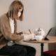 Image of a woman working with a mask and gloves in a COVID business world