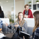 Image of a team of workers collaborating and discussing dynamic strategy