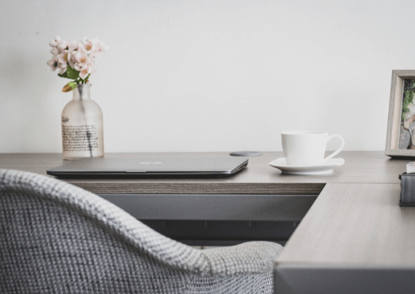 A remote office setup with chair and laptop