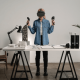 Photo of a woman in an office using virtual technology
